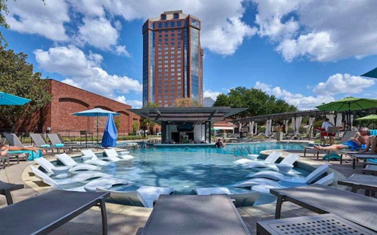 Relax and unwind at the outdoor pool at the Dallas Anatole. Photo credit: Dallas Anatole Hotel