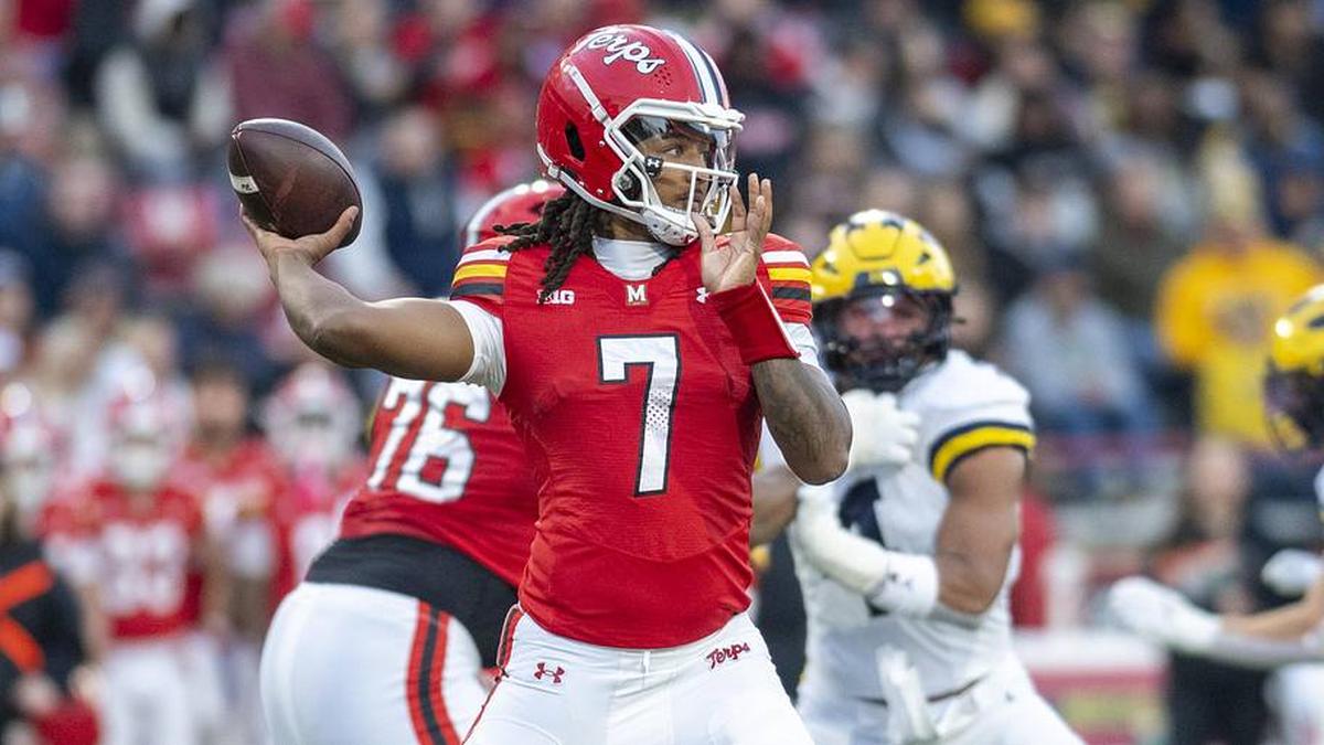  Nov 22, 2025; College Park, Maryland, USA; Maryland Terrapins quarterback Malik Washington (7) drops back to pass during the first half against the Michigan Wolverines at SECU Stadium. Mandatory Credit: Tommy Gilligan-Imagn Images | Tommy Gilligan-Imagn Images 