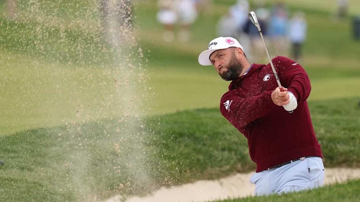  Jon Rahm hits a bunker shot on the sixth fairway during the second round of the PGA Championship. | Bill Streicher-Imagn Images 