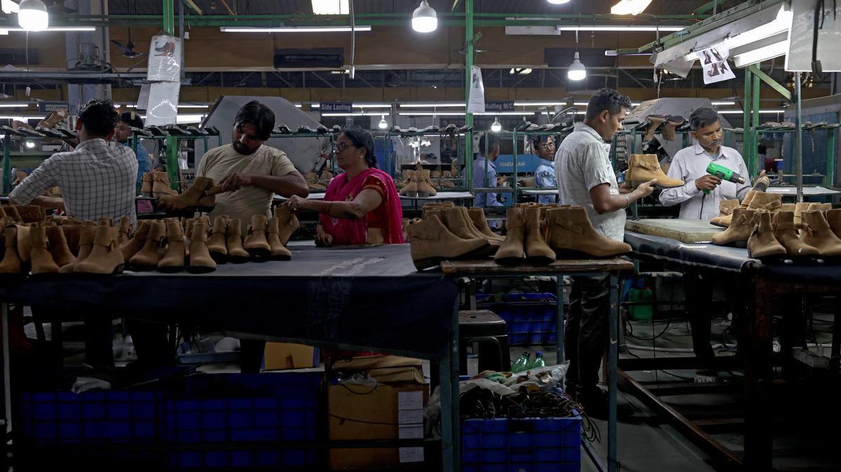 Workers make shoes inside a leather factory of Superhouse Group in Kanpur, India, May 12, 2026. REUTERS/Bhawika Chhabra