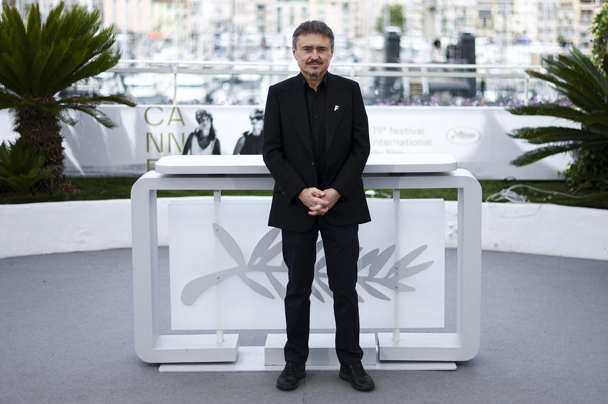 Director Cristian Mungiu poses during a photocall for the film "Fjord" in competition at the 79th Cannes Film Festival in Cannes, France, May 19, 2026. REUTERS/Gonzalo Fuentes