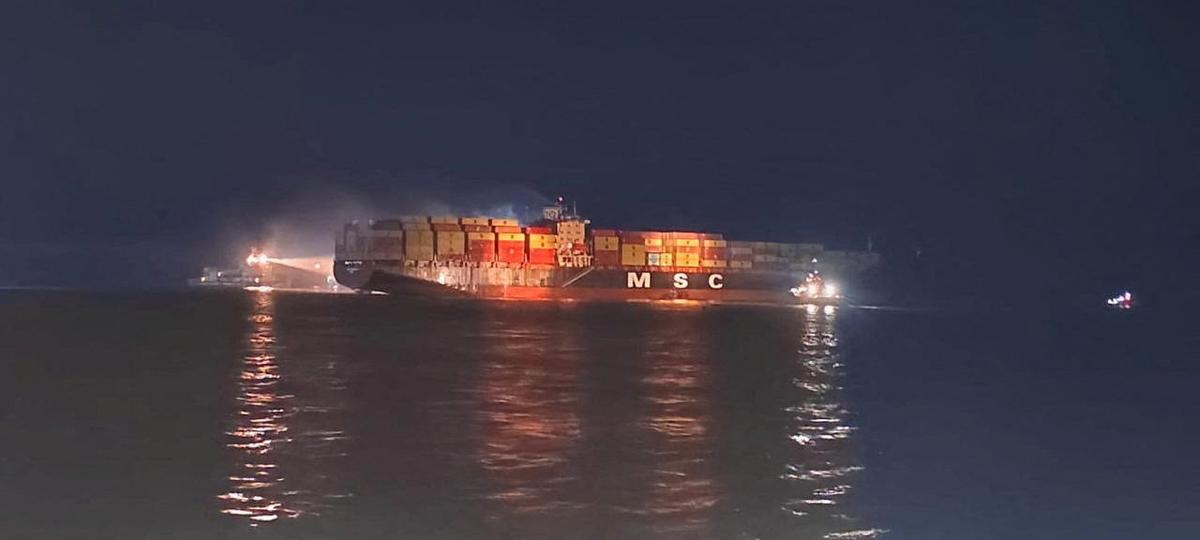 Personnel on boats work to extinguish a fire on the Sariska V vessel in the Persian Gulf after MSC, the world's largest shipping group, said the vessel was struck by two projectiles in Iraq's Umm Qasr port, in this handout image released June 2, 2026.