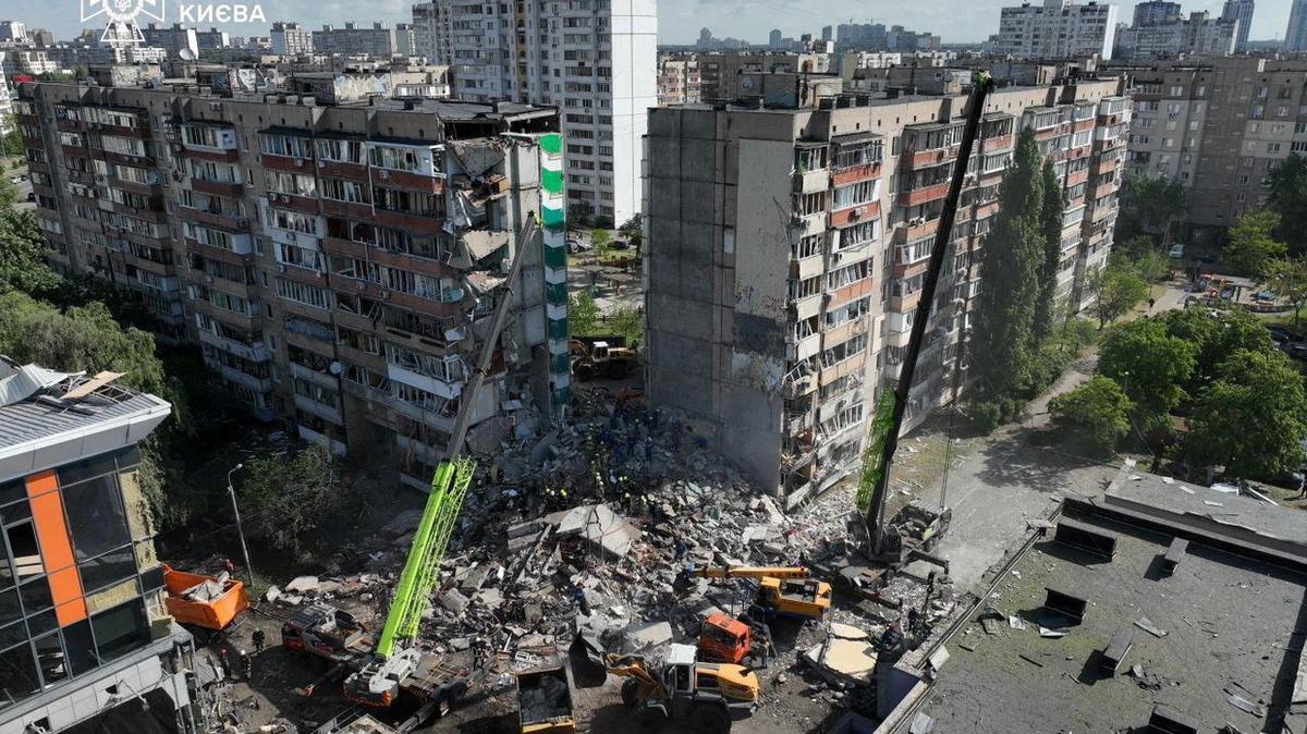 Firefighters work at a site of the apartment building damaged during a Russian missile and drone strike, amid Russia's attack on Ukraine, in Kyiv, Ukraine in this handout picture released May 14, 2026. Press service of the State Emergency Service of Ukraine in Kyiv/Handout via REUTERS