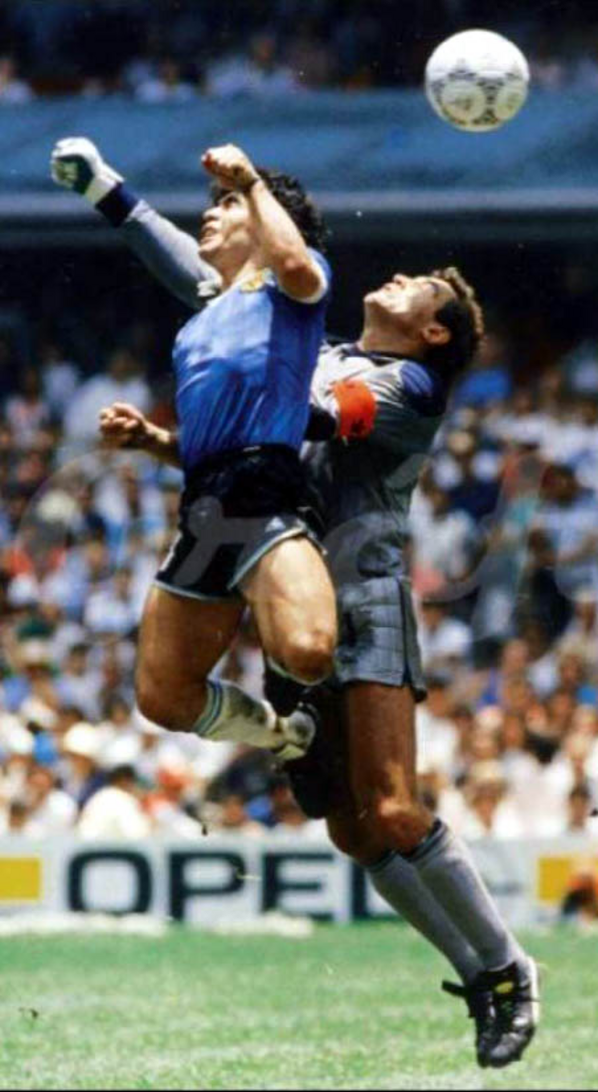  Maradona and the moment after "La mano de Dios" hit the ball the would end up in the back of the net giving Argentina the 2-1 over England in the 1986 World Cup. (El Gráfico via Wikimedia Commons) 