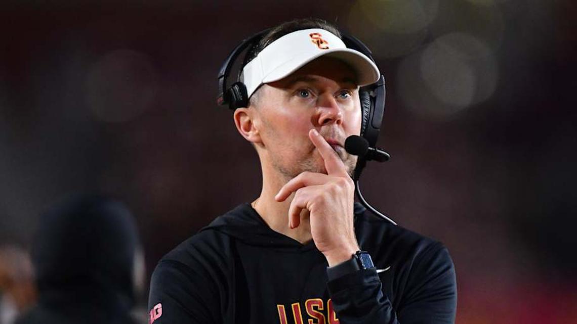 Nov 7, 2025; Los Angeles, California, USA; Southern California Trojans head coach Lincoln Riley watches game action against the Northwestern Wildcats during the second half at the Los Angeles Memorial Coliseum. Mandatory Credit: Gary A. Vasquez-Imagn Images | Gary A. Vasquez-Imagn Images 