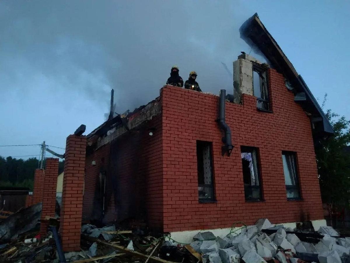 Firefighters work at a damaged house after a Ukrainian drone attack in the Moscow region, Russia May 17, 2026.  Moscow Regional Governor Andrei Vorobyov/Handout via REUTERS