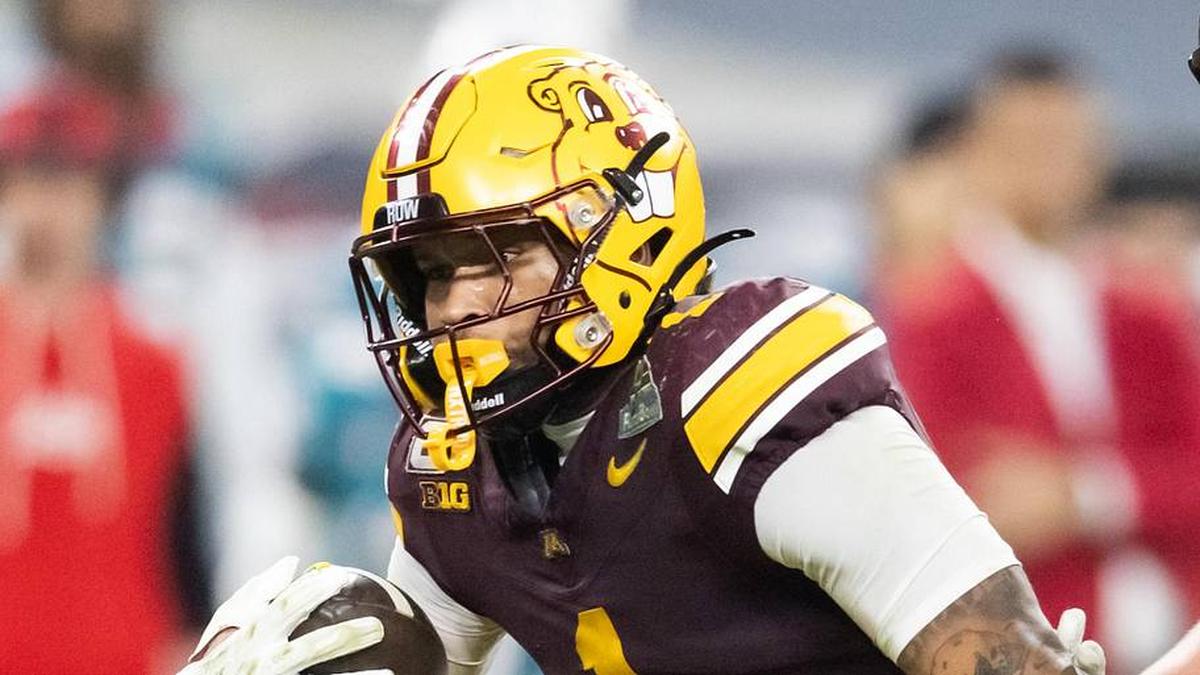  Dec 26, 2025; Phoenix, AZ, USA; Minnesota Golden Gophers running back Darius Taylor (1) against the New Mexico Lobos during the Rate Bowl at Chase Field. Mandatory Credit: Mark J. Rebilas-Imagn Images | Mark J. Rebilas-Imagn Images 