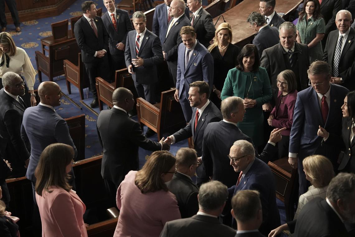 From left: Vice President JD Vance, Senate Majority Leader John Thune (R-S.D.) and Senate Minority Leader Chuck Schumer (D-N.Y.) greet people as they arrive before an address by King Charles III to a joint meeting of Congress in honor of the 250th anniversary of American independence at the Capitol in Washington, on Tuesday, April 28, 2026. (Salwan Georges/The New York Times)