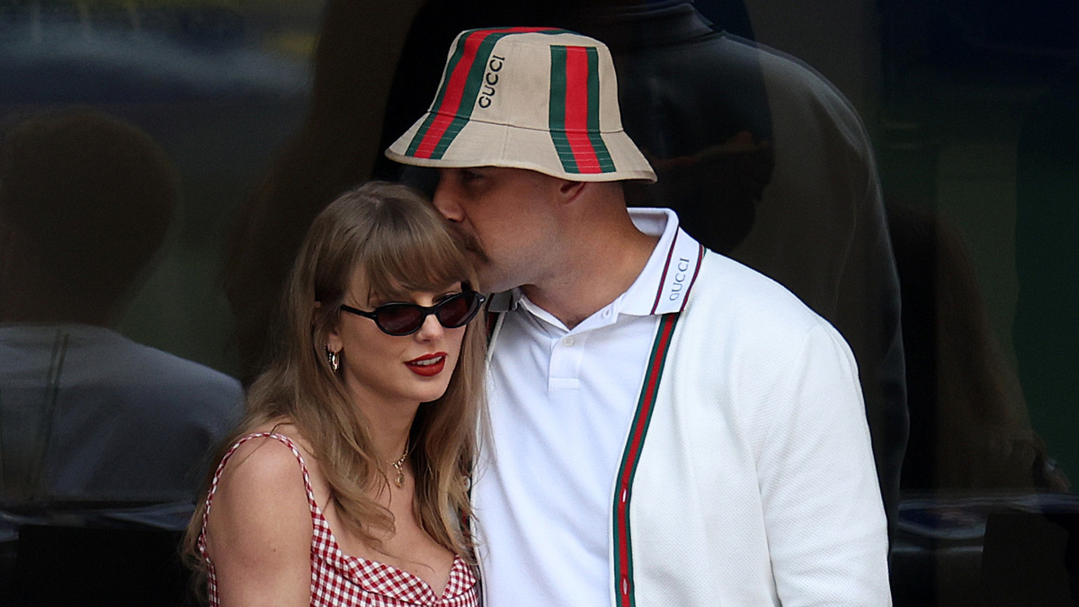 NEW YORK, NEW YORK - SEPTEMBER 08:  Singer-songwriter Taylor Swift and Travis Kelce of the Kansas City Chiefs attend the Men's Singles Final match between Taylor Fritz of the United States and Jannik Sinner of Italy on Day Fourteen of the 2024 US Open at USTA Billie Jean King National Tennis Center on September 08, 2024 in the Flushing neighborhood of the Queens borough of New York City.