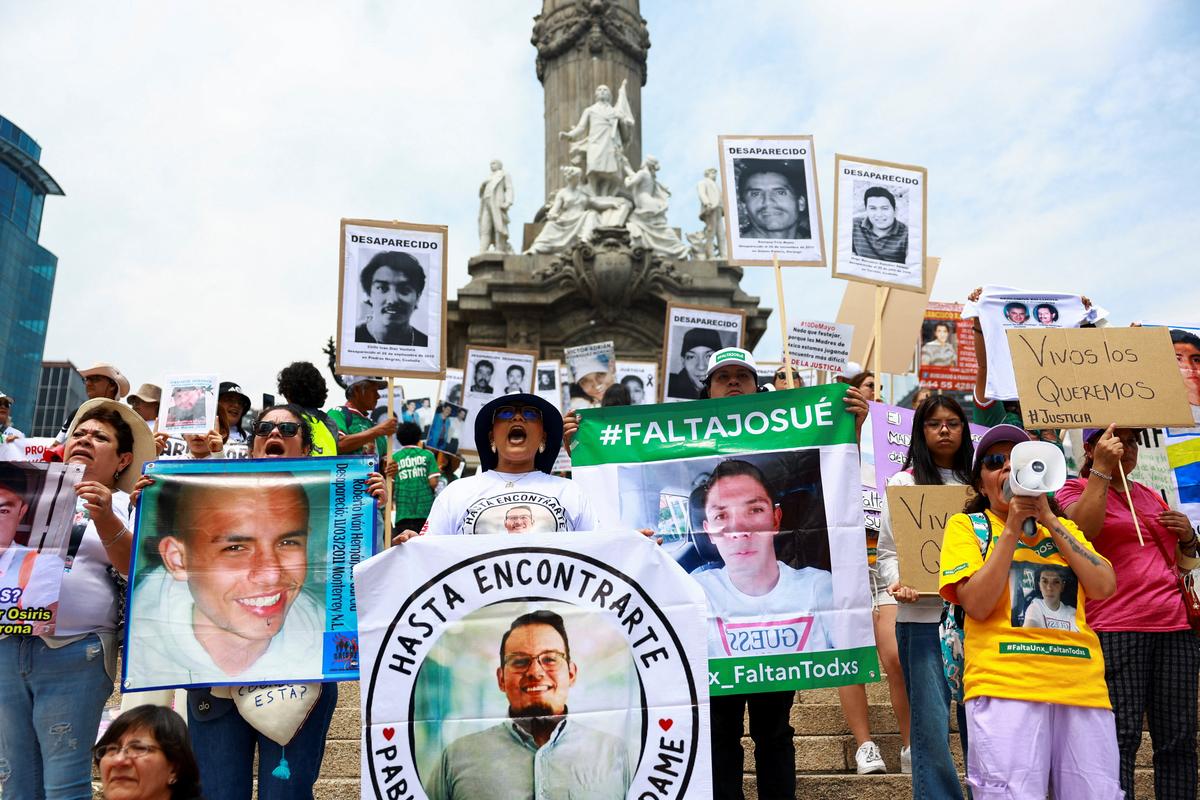 Collectives and families of the disappeared march on Mother's day asking for support in their fight against impunity in Mexico ahead of the 2026 FIFA World Cup, in Mexico City, Mexico May 10, 2026. REUTERS/Raquel Cunha