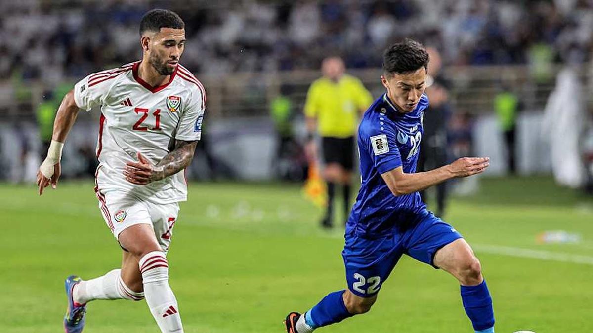  Abbosbek Fayzullaev (right) has been key to Uzbekistan's ascent. | FADEL SENNA/AFP/Getty Images. 