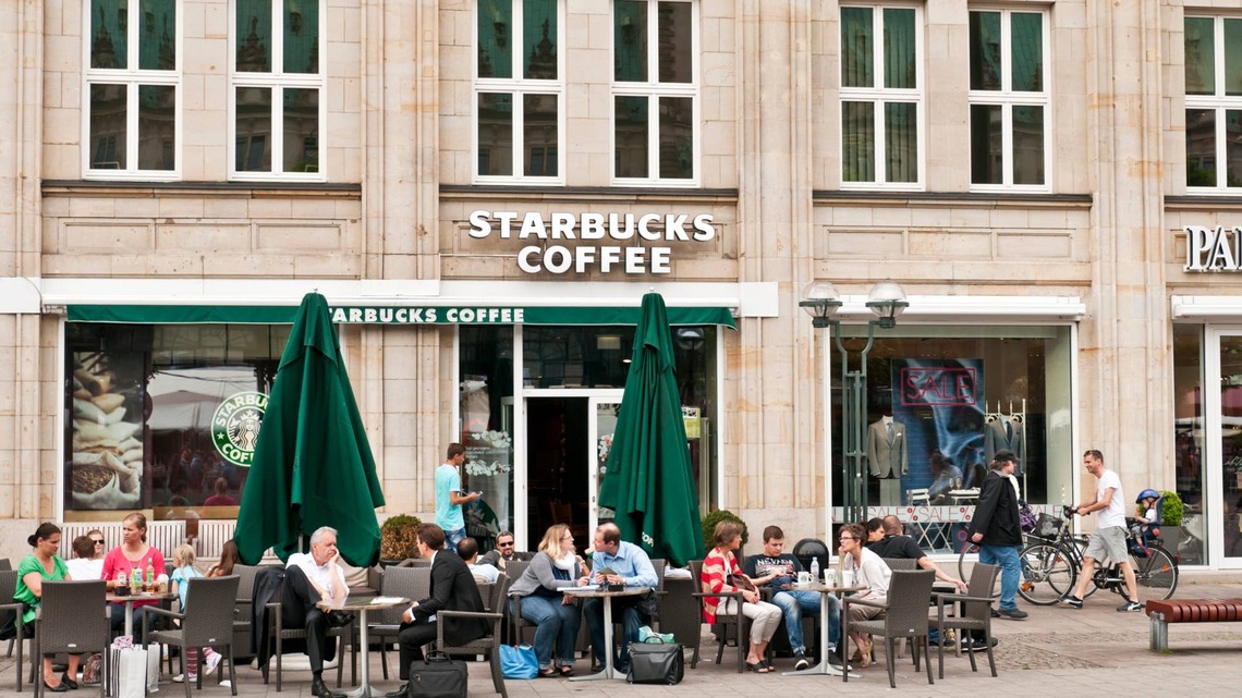 Starbucks cuts more jobs as $2 billion turnaround expands 