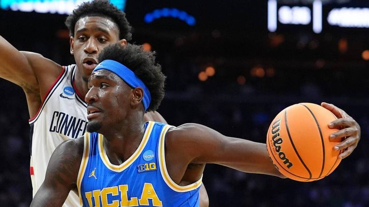  Mar 22, 2026; Philadelphia, PA, USA; UCLA Bruins forward Eric Dailey Jr. (3) dribbles the ball against the UConn Huskies in the first half during a second round game of the men's 2026 NCAA Tournament at Xfinity Mobile Arena. Mandatory Credit: Kyle Ross-Imagn Images | Kyle Ross-Imagn Images 