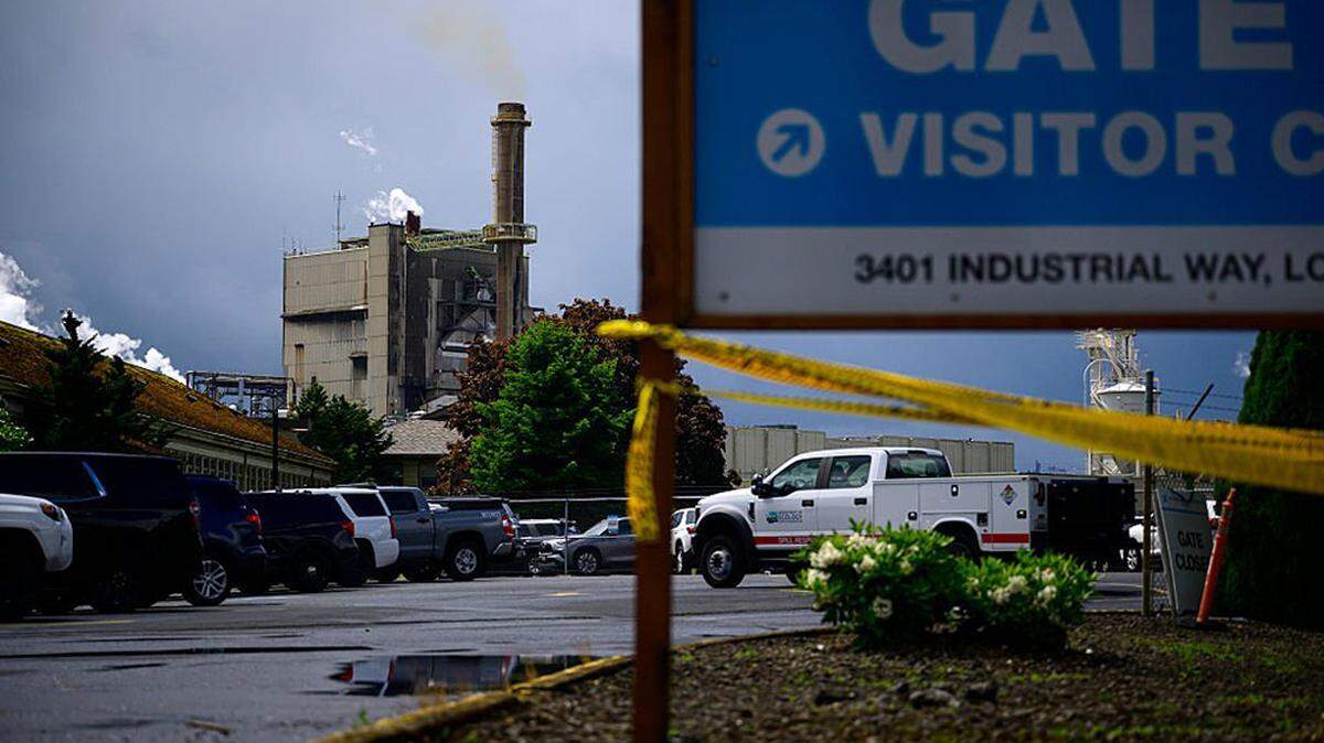 A Spill Response Team vehicle sits parked in front of the Nippon Dynawave Packaging facility following a fatal chemical storage tank implosion in Longview, Washington, on Tuesday. Authorities confirmed in a statement that there were fatalities and multiple critical injuries at the pulp and paper mill, but no specific numbers were provided.