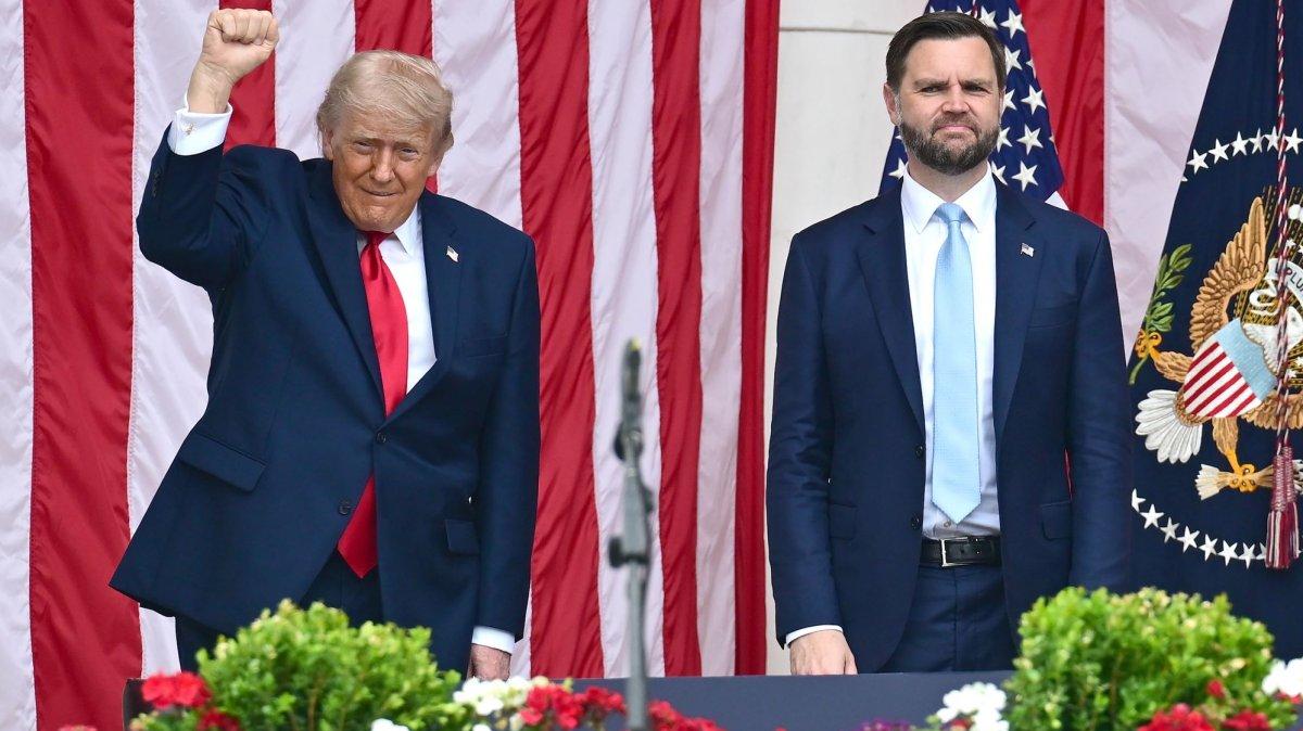 United States President Donald Trump gestures to the crowd as U.S. Vice President JD Vance looks on prior to delivering remarks on Memorial Day after laying a wreath at the Tomb of the Unknowns at Arlington National Cemetery. Trump and his full Cabinet are expected to meet Wednesday at Camp David amid uncertainty about the conflict in Iran. Photo by Kyle Mazza /UPI