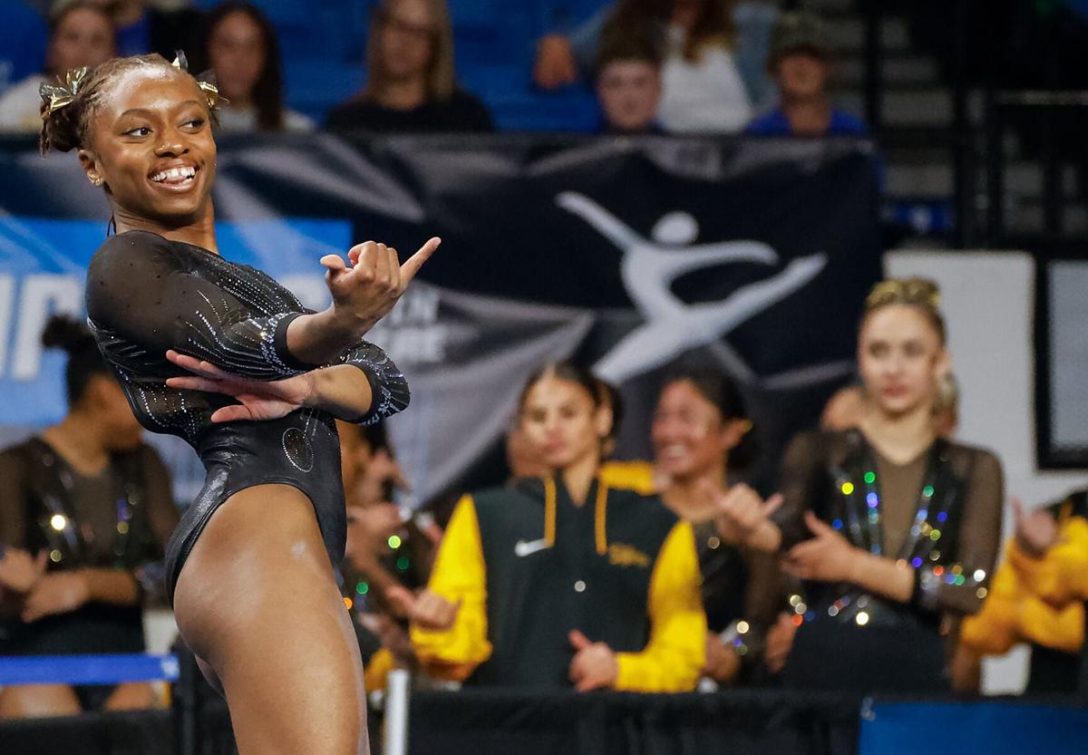 Hannah Horton strikes a pose during her floor routine at the NCAA Lexington Regional on Friday at the Historic Memorial Coliseum in Lexington, Ky. Horton earned a session high 9.925.