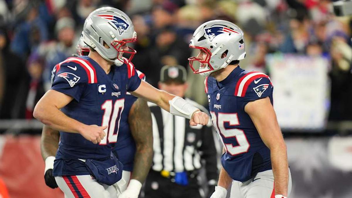 Jan 11, 2026; Foxborough, MA, USA; New England Patriots tight end Hunter Henry (85) celebrates with New England Patriots quarterback Drake Maye (10) after scoring a touchdown during the fourth quarter against the Los Angeles Chargers in an AFC Wild Card Round game at Gillette Stadium. Mandatory Credit: David Butler II-Imagn Images | David Butler II-Imagn Images 