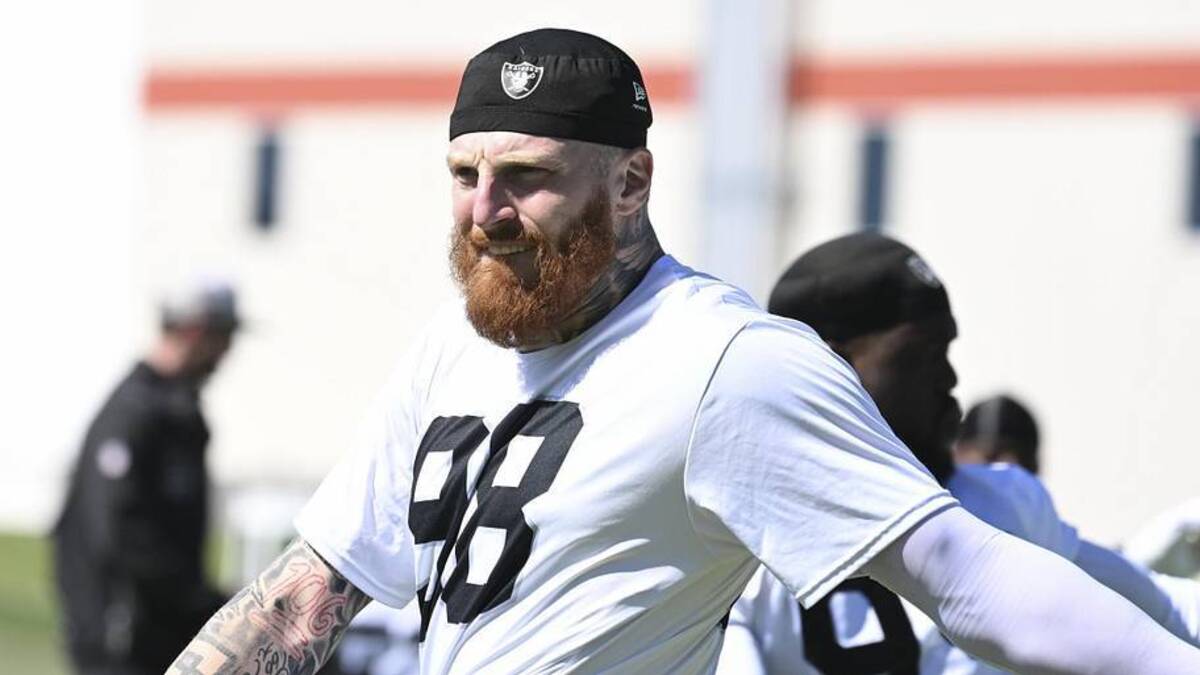  May 28, 2026; Henderson, NV, USA; Las Vegas Raiders defensive end Maxx Crosby (98) stretches during organized team activities at Intermountain Health Performance Center. Mandatory Credit: Candice Ward-Imagn Images | Candice Ward-Imagn Images 