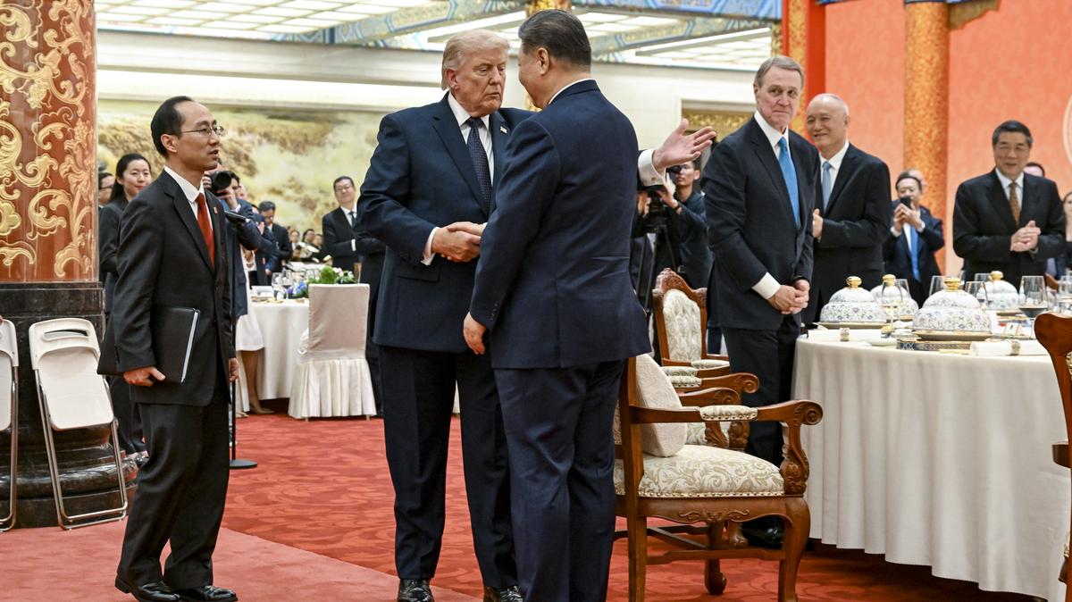 President Donald Trump and President Xi Jinping take their seats for a state banquet at the Great Hall of the People in Beijing on Thursday, May 14, 2026. President Trump's open willingness to hold up a $14 billion Taiwan arms package is a win for Beijing. Now China could be weighing how to keep the weapons on ice for as long as it can. (Kenny Holston/The New York Times)