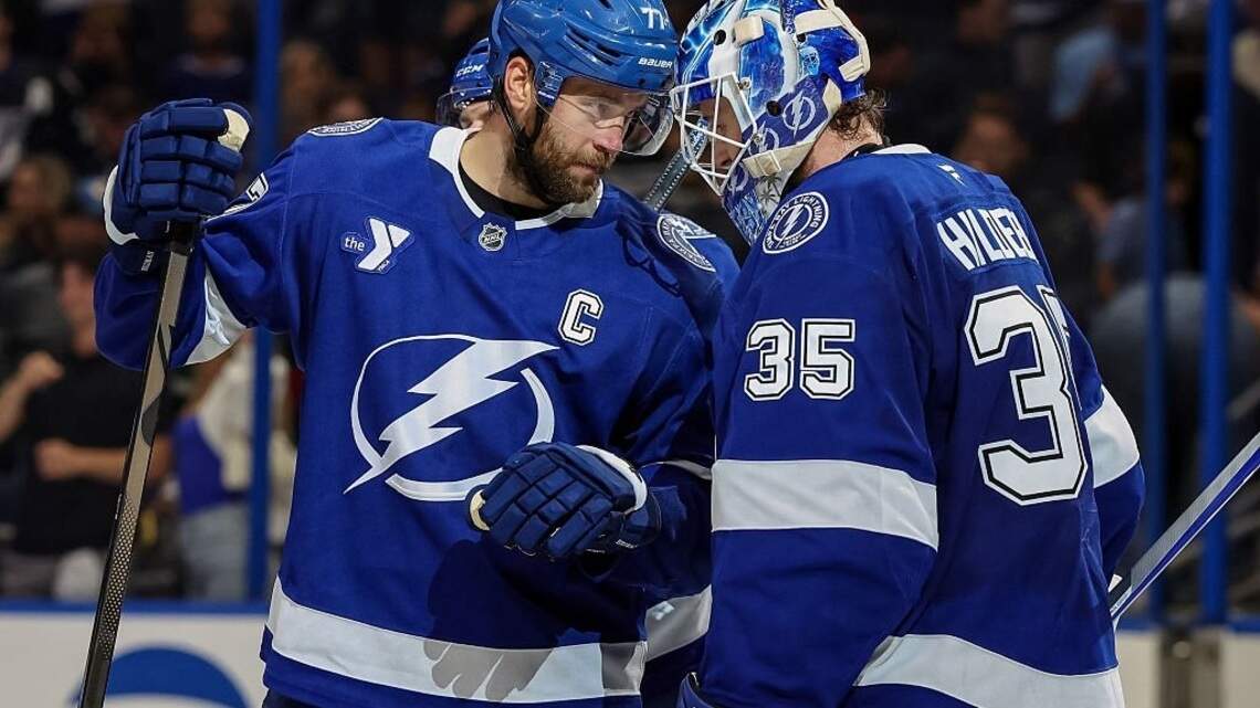 Lightning rally from 2 down to beat Canucks