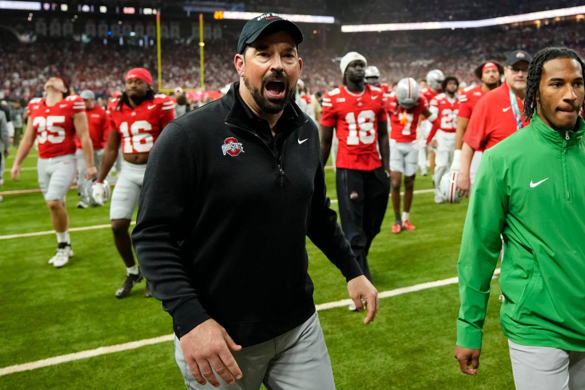  Ohio State Buckeyes head coach Ryan Day yells for his players to stop while leaving the field following the Big Ten Conference championship game against the Indiana Hoosiers at Lucas Oil Stadium in Indianapolis on Dec. 6, 2025. Ohio State lost 13-10. 