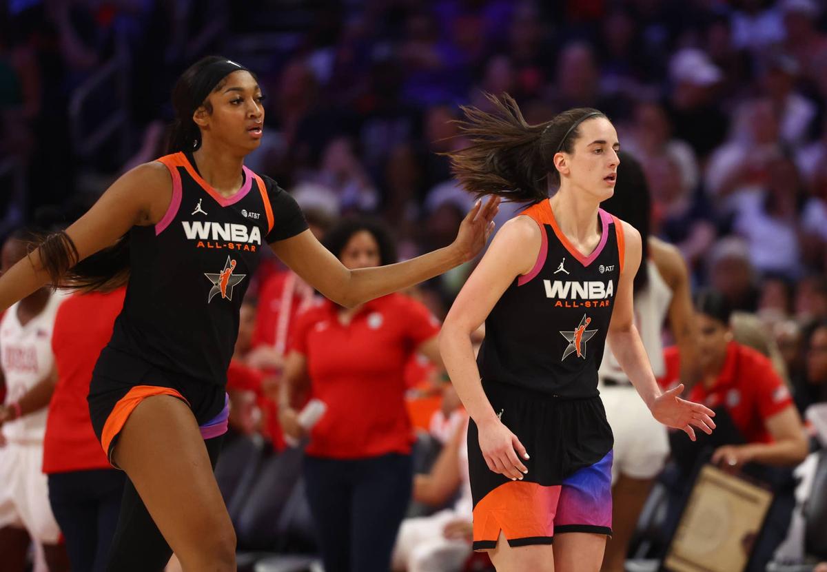  Jul 20, 2024; Phoenix, AZ, USA; Team WNBA guard Caitlin Clark (right) and Angel Reese against the USA Women's National Team during the 2024 WNBA All Star Game at Footprint Center. Mandatory Credit: Mark J. Rebilas-USA TODAY Sports 