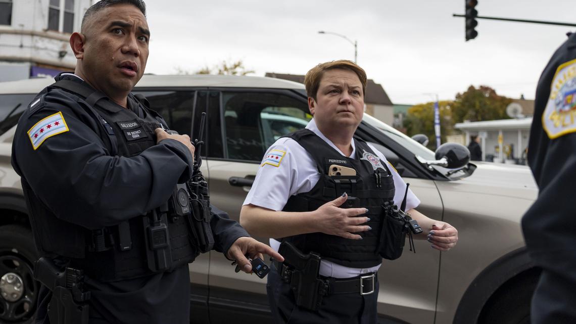 Chicago police respond to West 26th Street and South Kedzie Avenue after a report of shots fired at Border Patrol agents on Nov. 8, 2025, in the Little Village neighborhood. (Brian Cassella/Chicago Tribune/TNS)