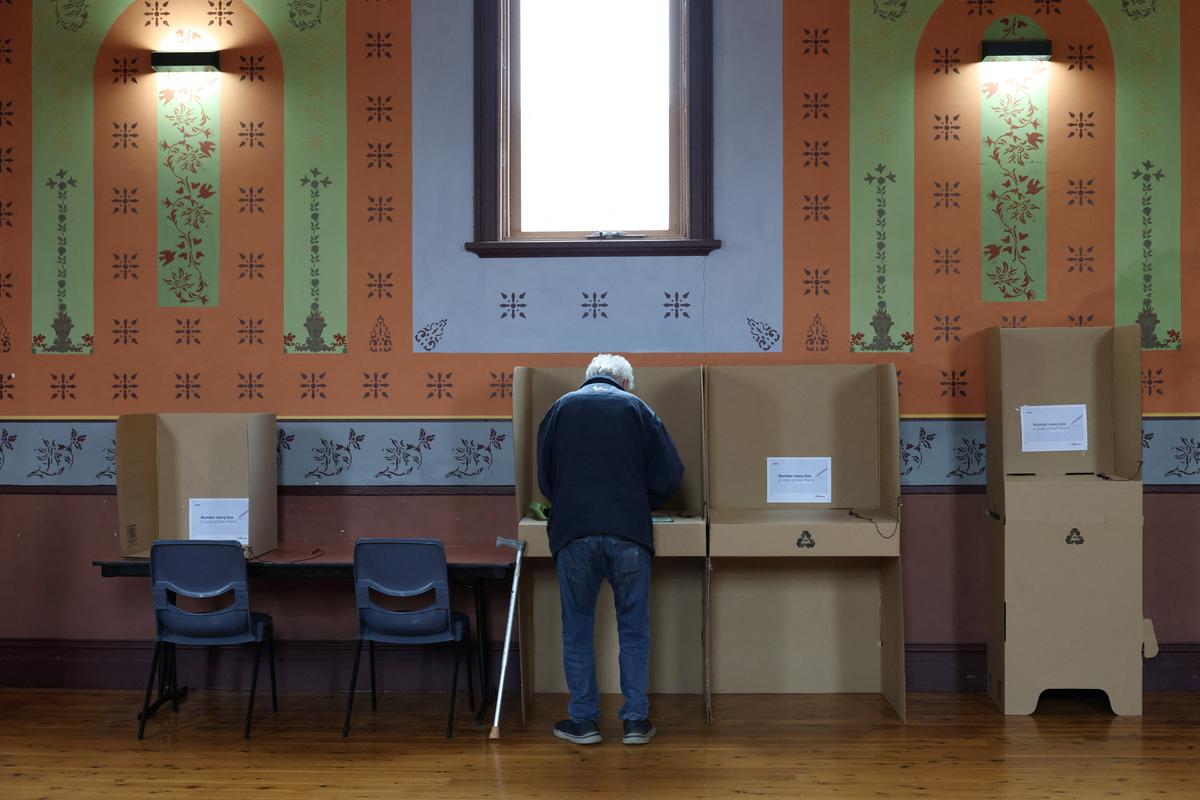 A man votes inside a pre-polling centre ahead of the Farrer by-election in Corowa, Australia, May 6, 2026. REUTERS/Hollie Adams