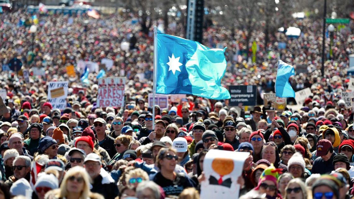 Protesters wave the Minnesota state flag during a No Kings Twin Cities protest in St. Paul, Minn., on March 28, 2026. (Renée Jones Schneider/The Minnesota Star Tribune/TNS)
