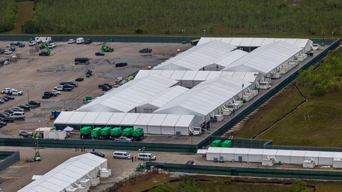 Aerial view of structures, including gigantic tents built at the recently opened migrant detention center, “Alligator Alcatraz,” located at the site of the Dade-Collier Training and Transition Airport in Ochopee, Florida, on Friday, July 4, 2025. (Pedro Portal/Miami Herald/TNS)