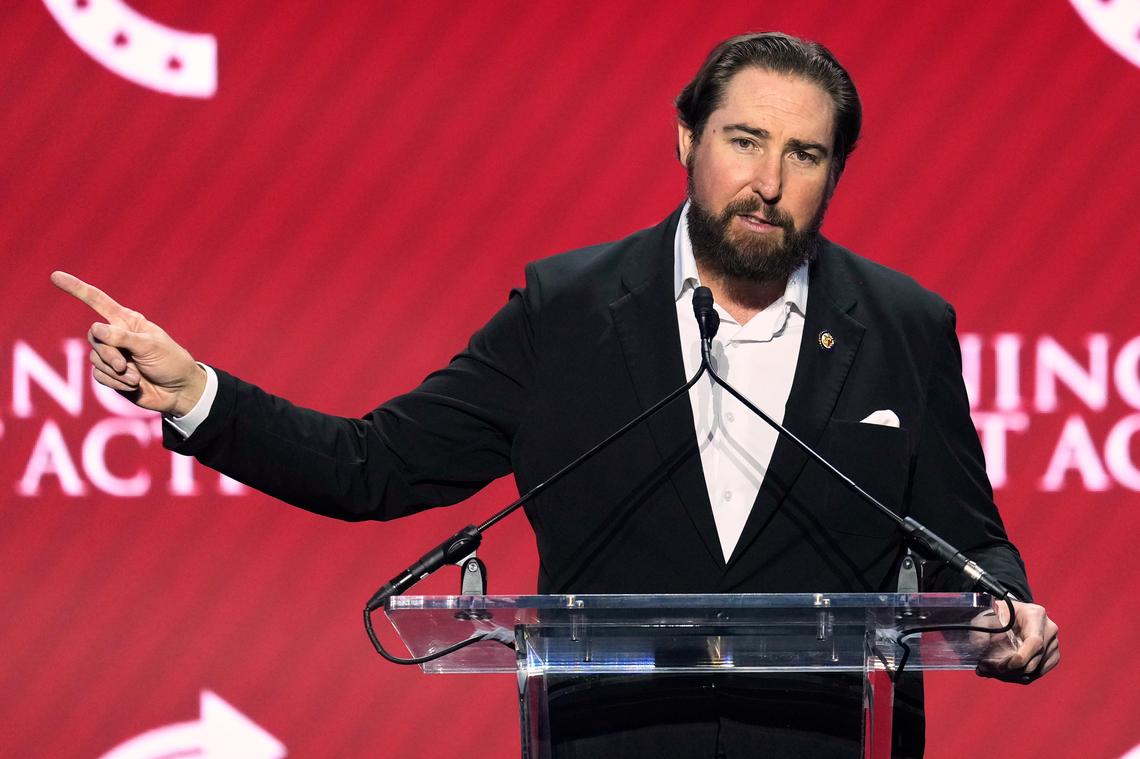  Representative Eli Crane speaks at a Turning Point USA event on April 17, 2026, in Phoenix, Arizona. 