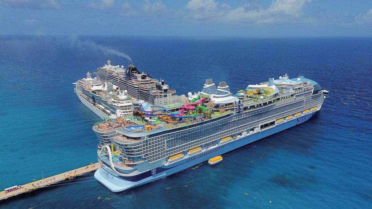 A drone view shows Royal Caribbean's Star of the Seas, Royal Caribbean's Radiance of the Seas, and MSC Cruises' MSC Seascape cruise ships docked at the Costa Maya Cruise Port, after Mexican authorities rejected a large water park planned for the area by Royal Caribbean, in Mahahual, Quintana Roo state, Mexico May 20, 2026. REUTERS/Paola Chiomante