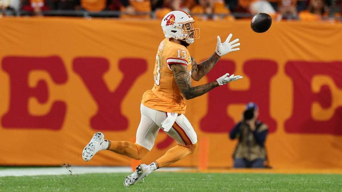  Dec 11, 2025; Tampa, Florida, USA; Tampa Bay Buccaneers wide receiver Mike Evans (13) catches a thirty-three yard pass thrown by quarterback Baker Mayfield (6) against the Atlanta Falcons during the second quarter at Raymond James Stadium. Mandatory Credit: Nathan Ray Seebeck-Imagn Images | Nathan Ray Seebeck-Imagn Images 