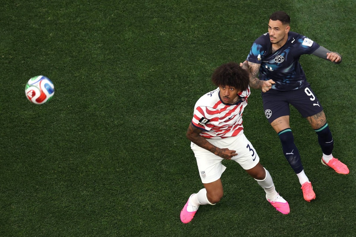  Chris Richards #3 of the United States and Antonio Sanabria #9 of Paraguay compete for the ball during the FIFA World Cup 2026 Group D match between USA and Paraguay at Los Angeles Stadium on June 12, 2026 in Los Angeles, California. (Photo by Harry How/Getty Images) Photo by Harry How/Getty Images