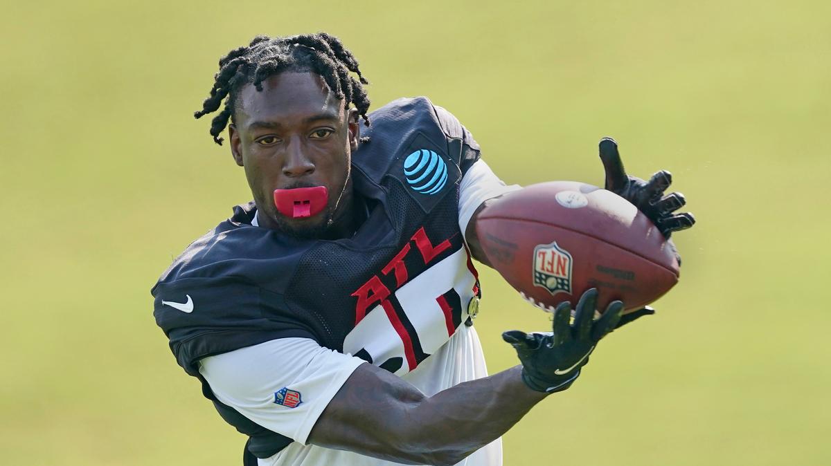 FILE - Atlanta Falcons wide receiver Calvin Ridley (18) makes a catch during the team’s NFL training camp football practice Monday, Aug. 9, 2021, in Flowery Branch, Ga. Falcons wide receiver Calvin Ridley has been suspended for the 2022 season for betting on NFL games in the 2021 season. The suspension announced by NFL commissioner Roger Goodell on Monday, March 7, 2022, is for activity that took place while Ridley was away from the team while addressing mental health concerns.(AP Photo/John Bazemore, File)