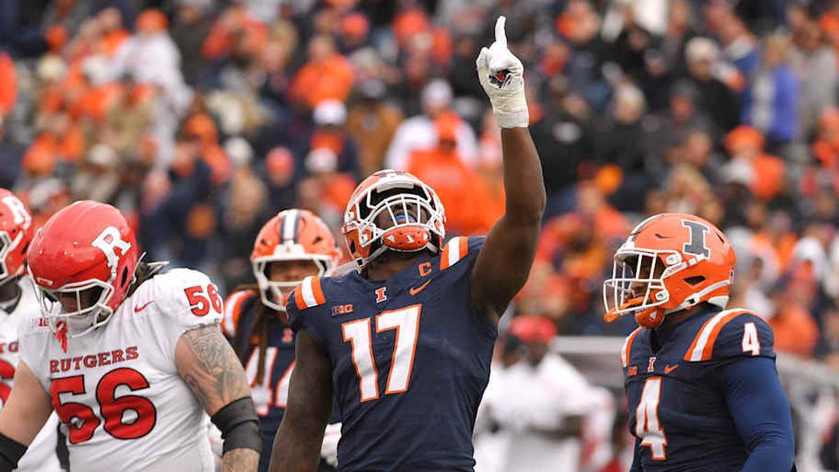  Nov 1, 2025; Champaign, Illinois, USA; Illinois Fighting Illini linebacker Gabe Jacas (17) celebrates his sack on Rutgers Scarlet Knights quarterback Athan Kaliakmanis (16) during the first half at Memorial Stadium. Mandatory Credit: Ron Johnson-Imagn Images | Ron Johnson-Imagn Images 