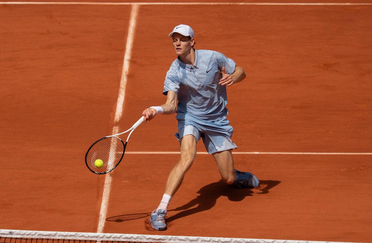  May 28, 2026; Paris, France; Jannik Sinner of Italy returns a shot during his match against Juan Manuel Cerundolo of Argentina on day five at Stade Roland Garros. Mandatory Credit: Susan Mullane-Imagn Images 