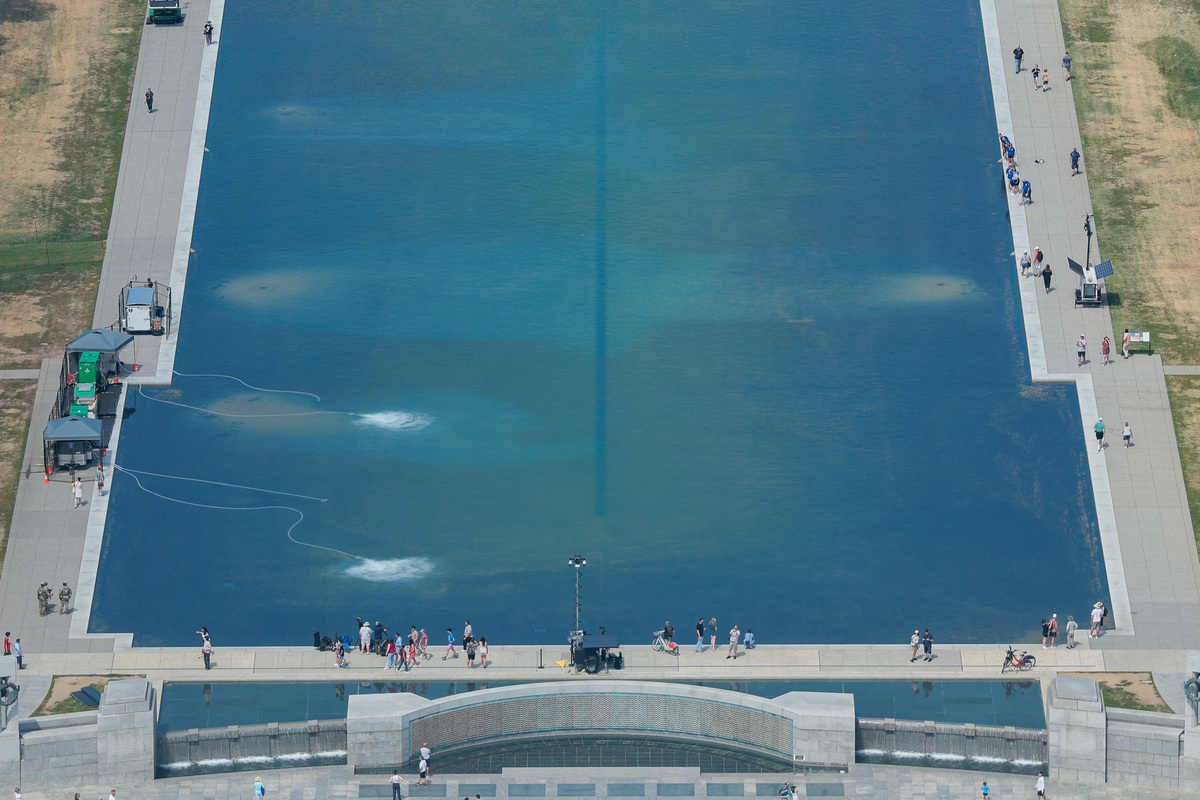 Cleanup continues on the Lincoln Memorial Reflecting Pool, after recent renovations following a directive from U.S. President Donald Trump to paint it blue ahead of the 250th anniversary of U.S. independence, in Washington, D.C., U.S., June 22, 2026. REUTERS/Kylie Cooper