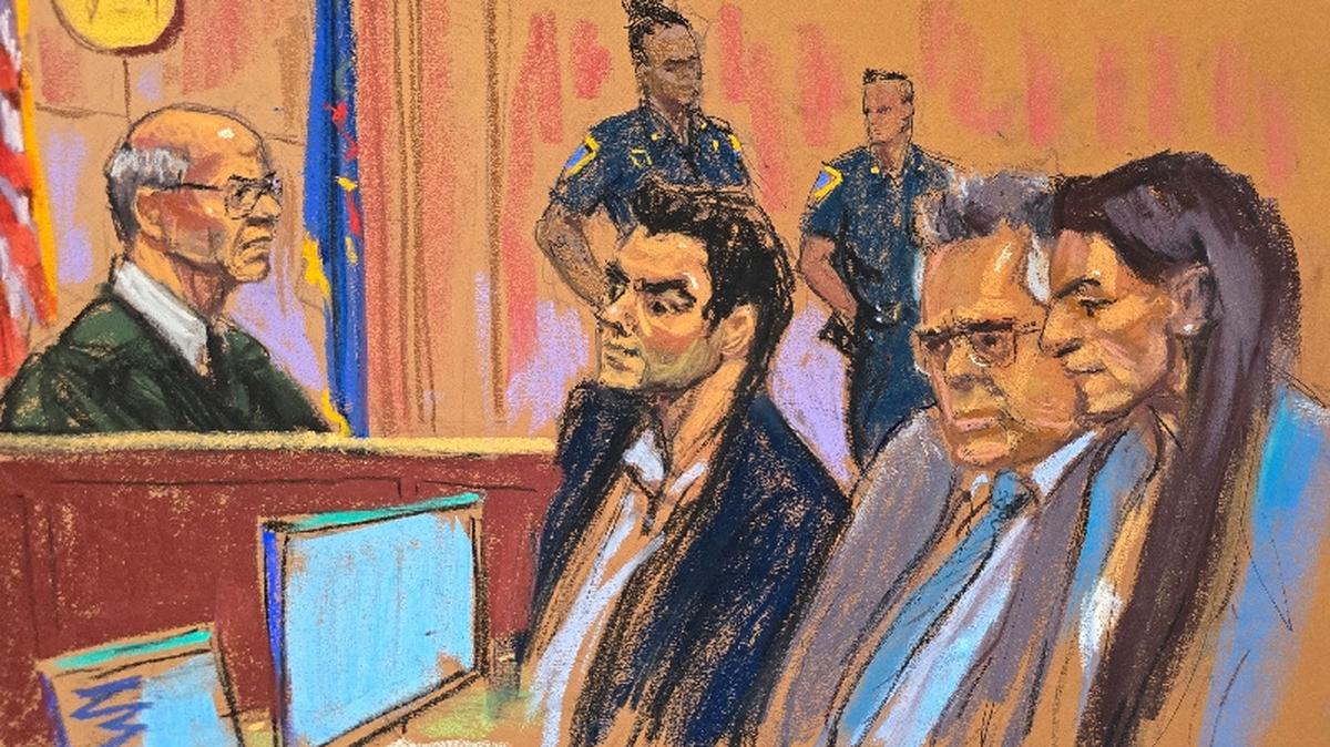 Luigi Mangione, who was arrested in December 2024 and charged with fatally shooting UnitedHealthcare CEO Brian Thompson on a sidewalk in Midtown Manhattan, sits next to his lawyers Marc Agnifilo and Karen Friedman Agnifilo before Justice Gregory Carro at an evidence suppression hearing at the Manhattan Supreme Court in New York City, U.S., May 18, 2026 in a courtroom sketch. REUTERS/Jane Rosenberg