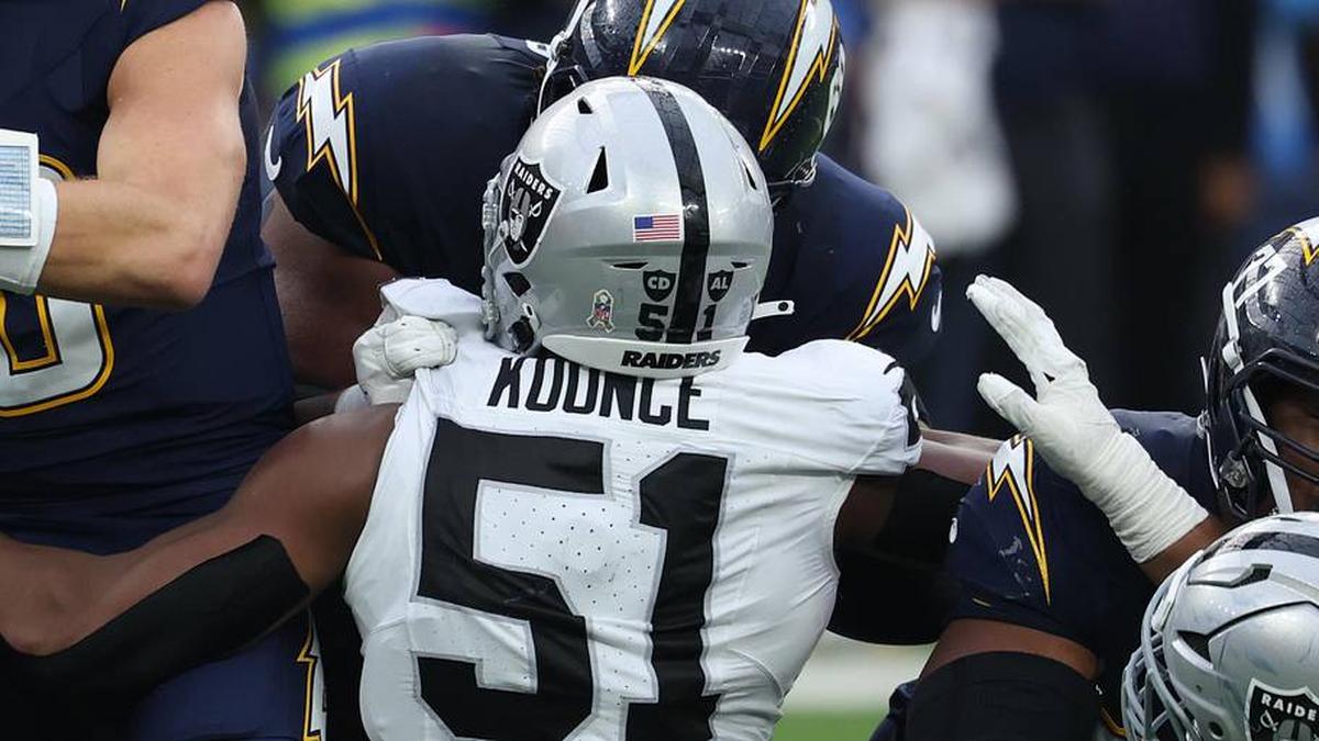  Nov 30, 2025; Inglewood, California, USA; Las Vegas Raiders defensive end Malcolm Koonce (51) sacks Los Angeles Chargers quarterback Justin Herbert (10) during the second half at SoFi Stadium. Mandatory Credit: Kiyoshi Mio-Imagn Images | Kiyoshi Mio-Imagn Images 