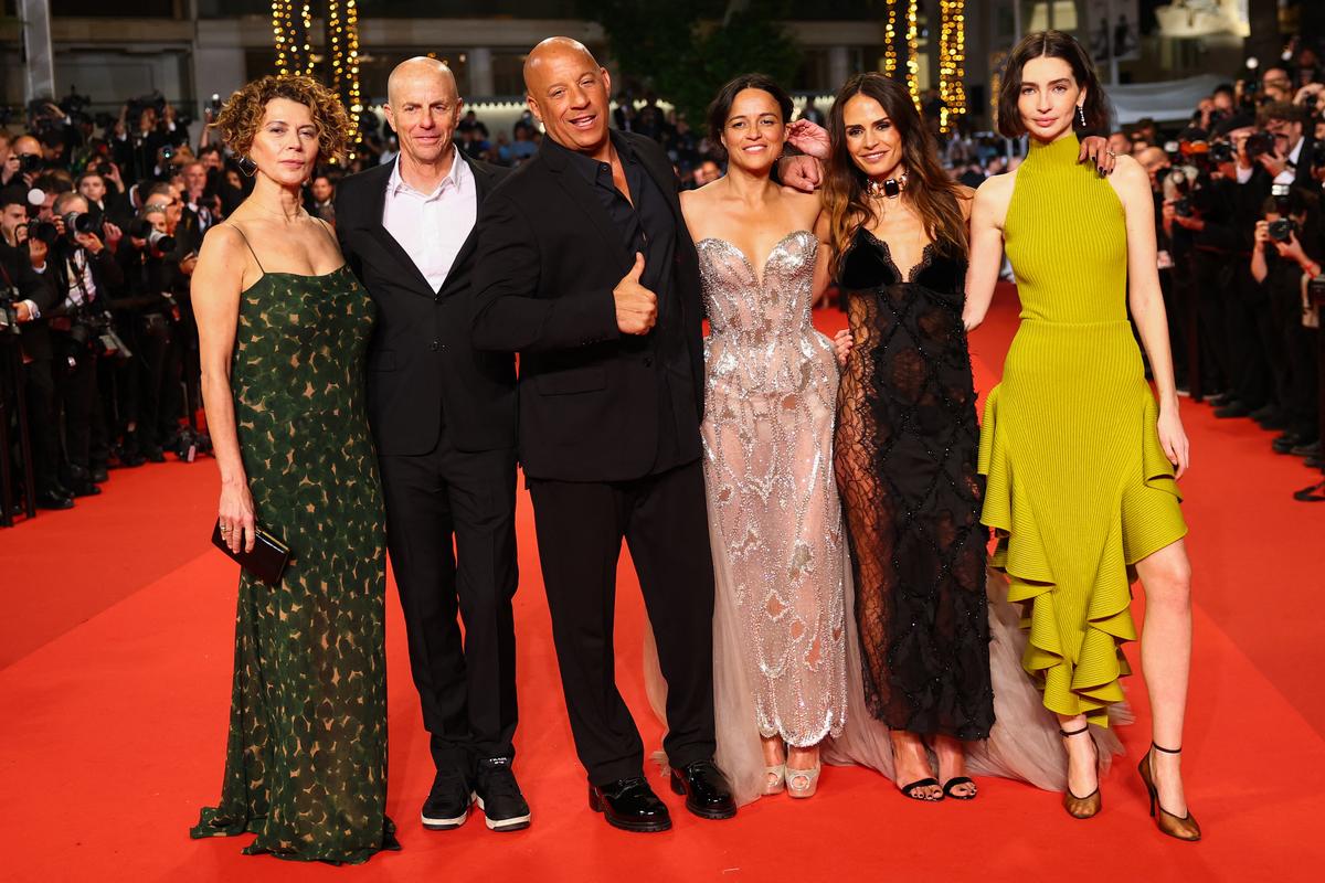 Jordana Brewster, Michelle Rodriguez, Neal H. Moritz, Meadow Walker, Vin Diesel and Donna Langley pose on the red carpet for the screening of the film "The Fast and the Furious" presented as part of Special Screenings to celebrate the 25th anniversary of "The Fast and the Furious" franchise at the 79th Cannes Film Festival in Cannes, France, May 14, 2026. REUTERS/Gonzalo Fuentes