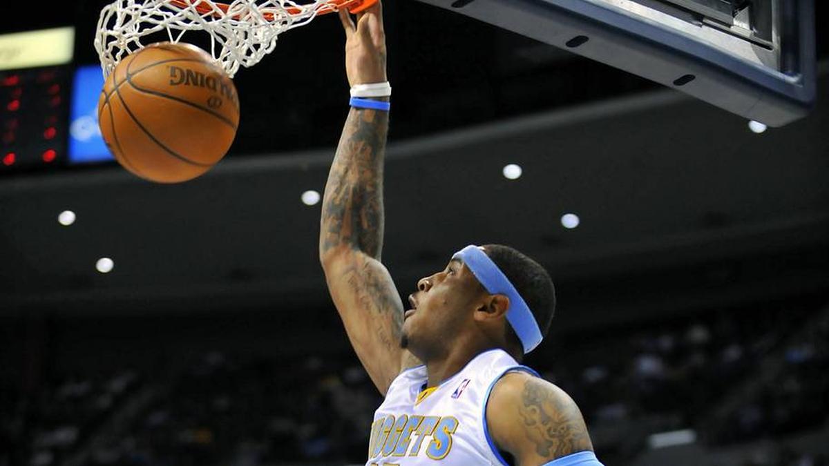  Carmelo Anthony's best shot at an NBA title came with the Nuggets in 2009, when he led them to the Western Conference finals. | Ron Chenoy-Imagn Images 