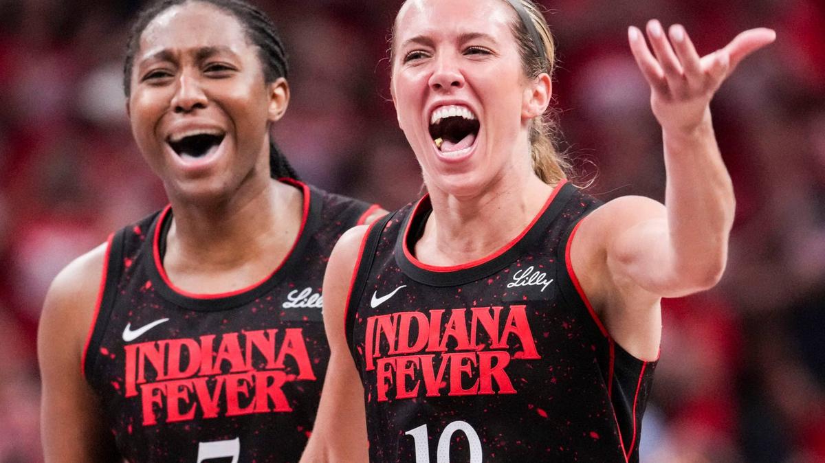 Indiana Fever forward Aliyah Boston (7) and guard Lexie Hull (10) react during a WNBA game.