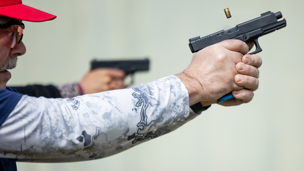 A member of the Illinois State Rifle Association board of directors fires a Glock 17 Gen. 5 at the Illinois State Rifle Association range in Bonfield, Illinois, on April 6, 2026. (Josh Boland/Chicago Tribune/TNS)