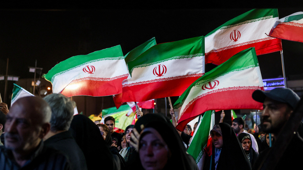 People wave Iranian flags during a rally in Tehran, Iran, May 29, 2026. Majid Asgaripour/WANA (West Asia News Agency) via REUTERS