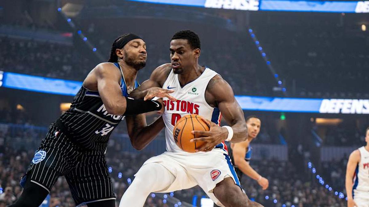  May 1, 2026; Orlando, Florida, USA; Detroit Pistons center Jalen Duren (0) dribbles the ball against Orlando Magic center-forward Wendell Carter Jr. (34) in the second quarter during game six of the first round of the 2026 NBA Playoffs at Kia Center. | Jeremy Reper-Imagn Images 