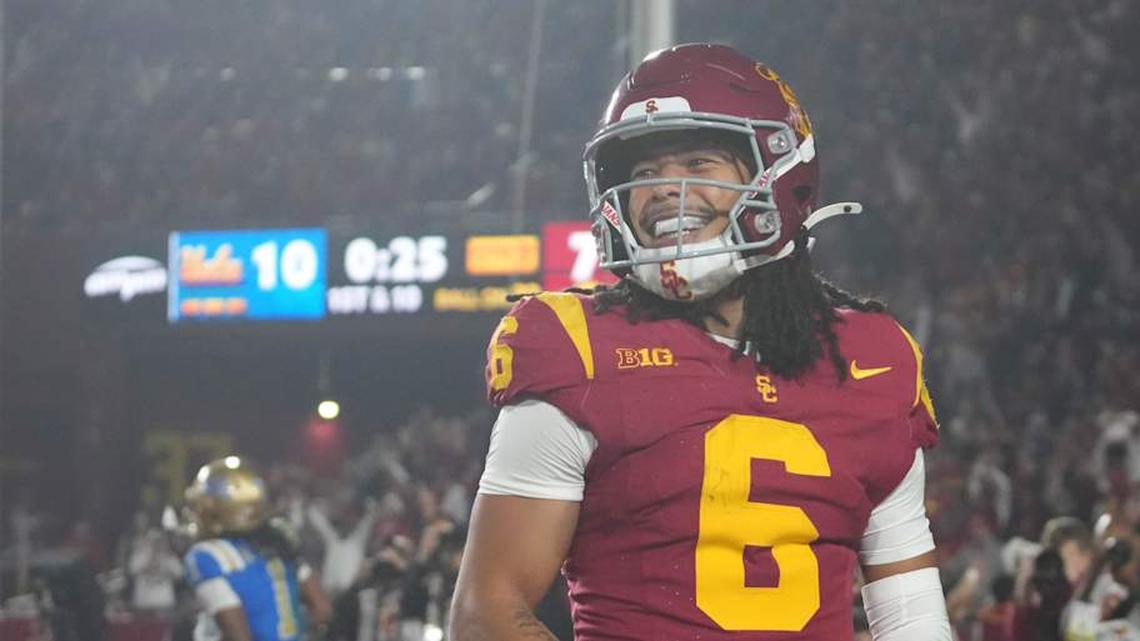  Nov 29, 2025; Los Angeles, California, USA; Southern California Trojans wide receiver Makai Lemon (6) celebrates after catching a 32-yard touchdown pass against the UCLA Bruins in the second half at United Airlines Field at Los Angeles Memorial Coliseum. Mandatory Credit: Kirby Lee-Imagn Images | Kirby Lee-Imagn Images 
