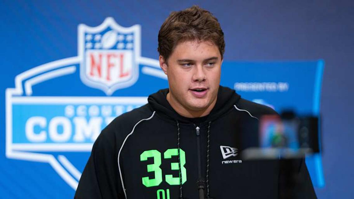  Feb 28, 2026; Indianapolis, IN, USA; Utah offensive lineman Caleb Lomu (OL33) speaks to members of the media during the NFL Combine at the Indiana Convention Center. Mandatory Credit: Jacob Musselman-Imagn Images | Jacob Musselman-Imagn Images 