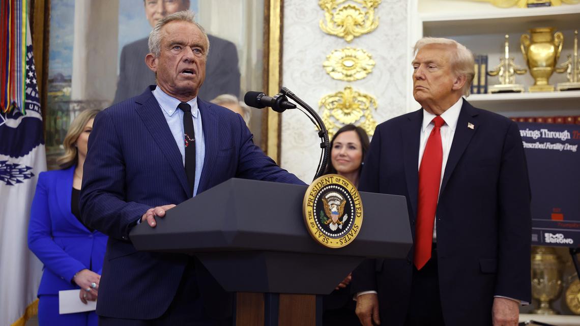 U.S. Health and Human Services Secretary Robert F. Kennedy Jr., left, delivers remarks alongside U.S. President Donald Trump during an event in the Oval Office of the White House on Oct. 16, 2025, in Washington, D.C. (Kevin Dietsch/Getty Images/TNS)