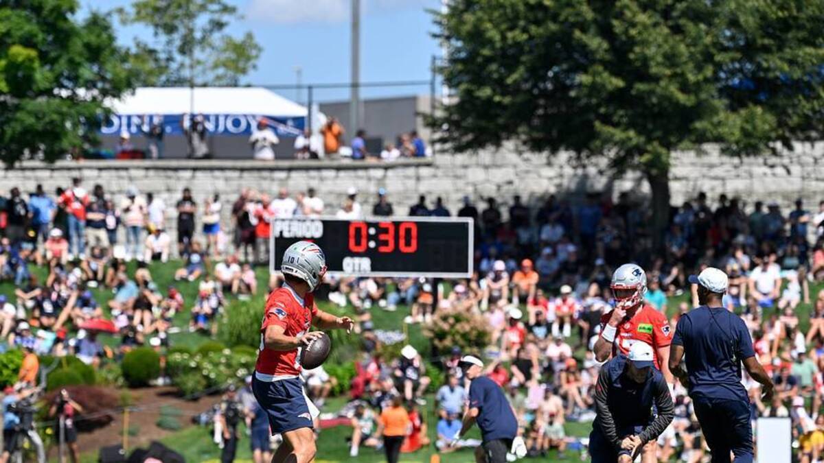  Jul 23, 2025; Foxborough, MA, USA; New England Patriots quarterback Drake Maye (10) throws a pass in front of fans during training camp at Gillette Stadium. Mandatory Credit: Eric Canha-Imagn Images | IMAGN IMAGES via Reuters Connect 